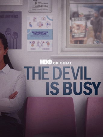Watch The Devil Is Busy 2024 poster